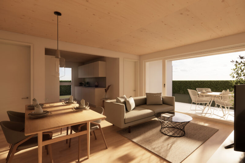 Helles, modernes Wohnzimmer mit Holzboden und Holzdecke, offener Küchenecke, Esstisch, komfortablem Sofa, großem Fenster zur Terrasse mit Gartenmöbeln und Pflanzen.
